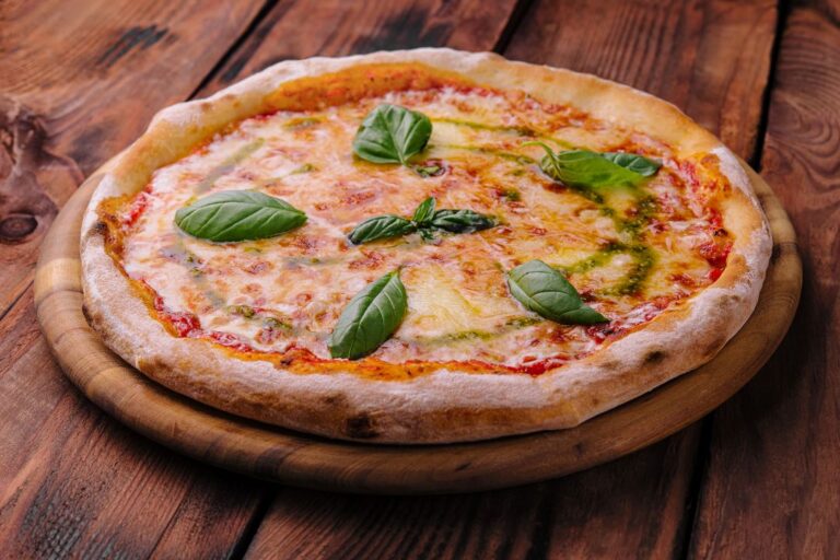homemade pizza italian margherita on wood 2023 03 14 20 56 58 utc 768x512
