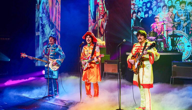 rain a tribute to the beatles in their sgt pepper attire 768x439