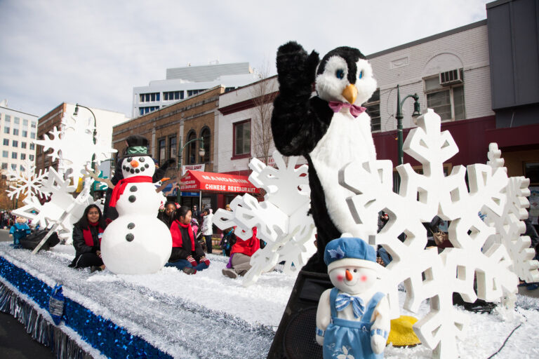 Silver Spring Mascot riding on Float at Thanksgiving Parade photo by Ken Stanek 768x512