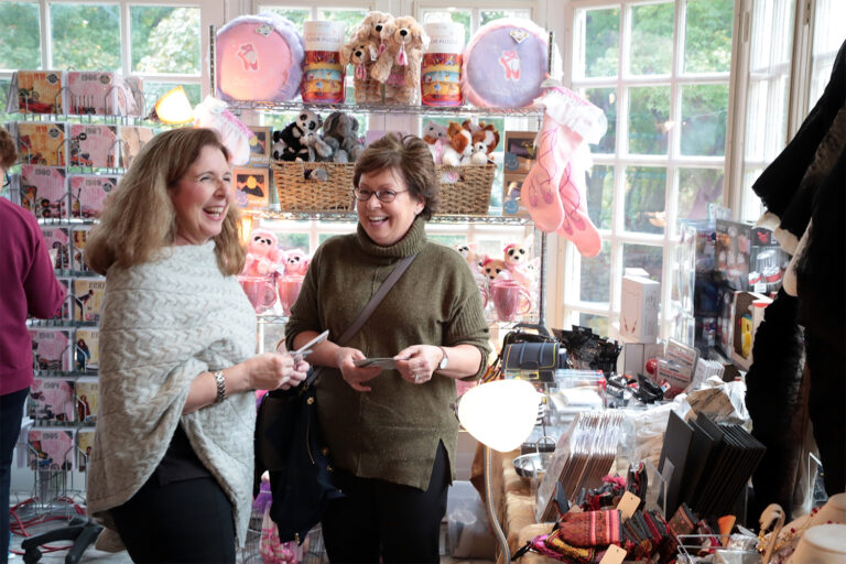 gift shop patrons laughing amongst the wares 768x512