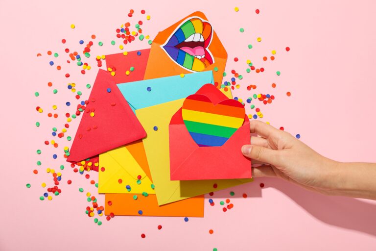 lgbt parade concept holiday symbols on pink backg 2025 03 26 03 33 24 utc 768x512